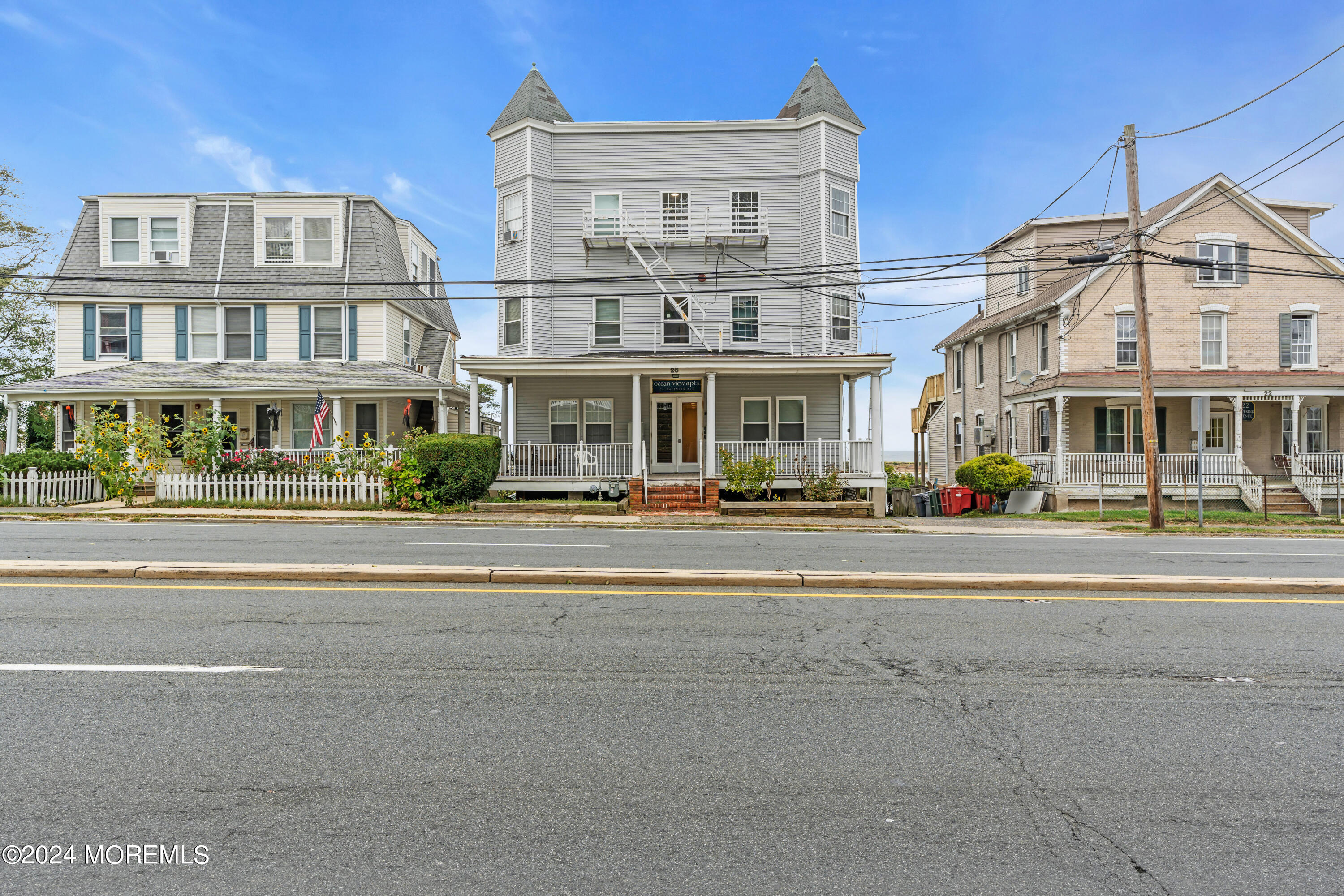 a front view of a building with street view