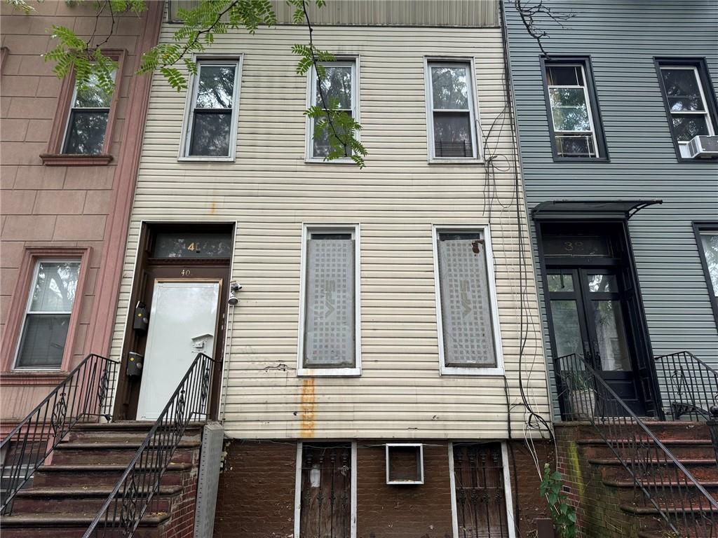 a view of a house with two windows