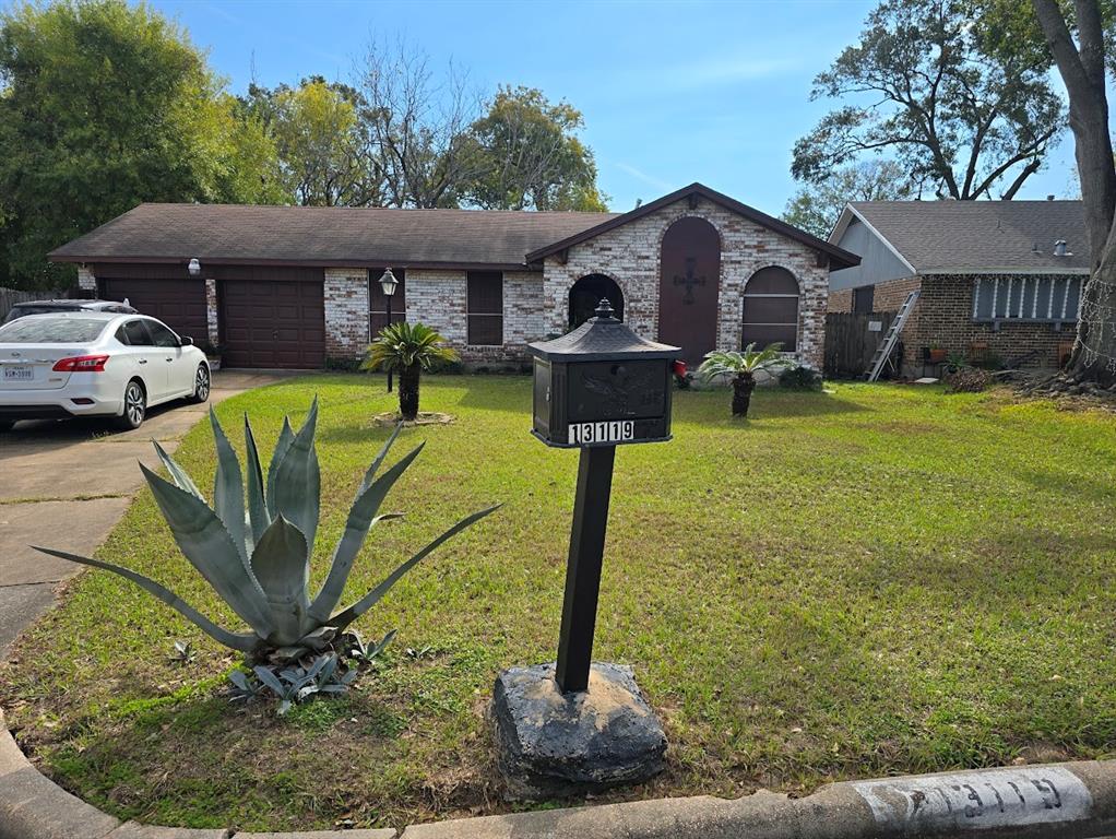 Long driveway for multiple vehicles and huge front lawn