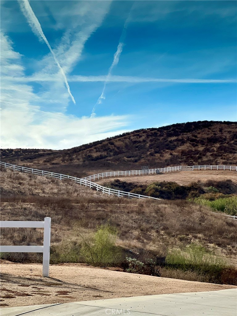 Property located behind white fence