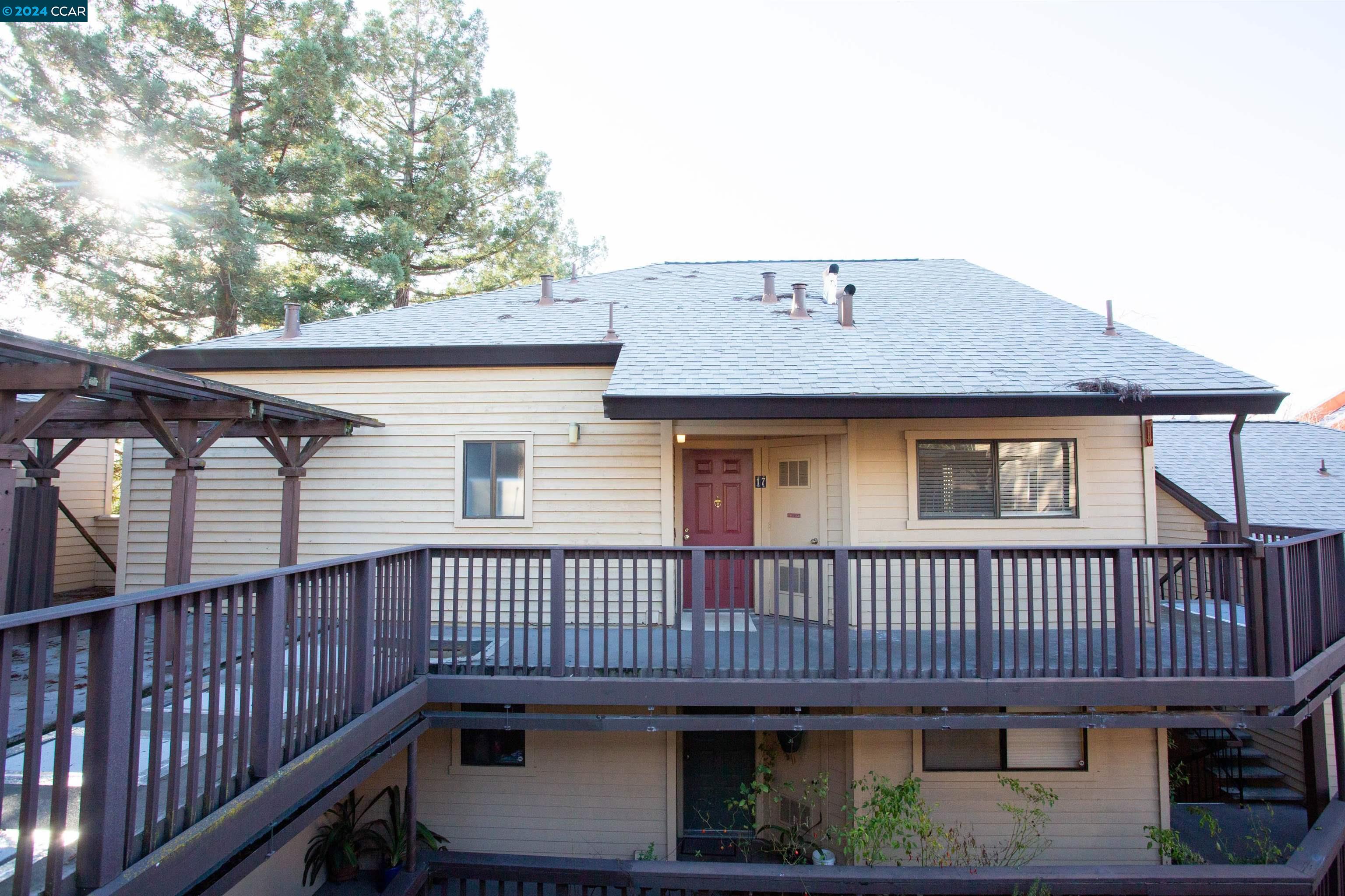 a view of a house with a deck