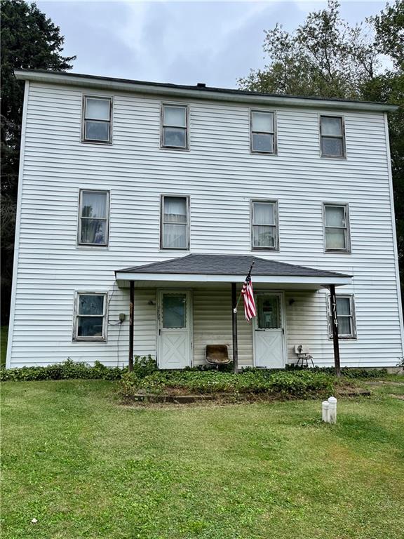 a front view of house with yard