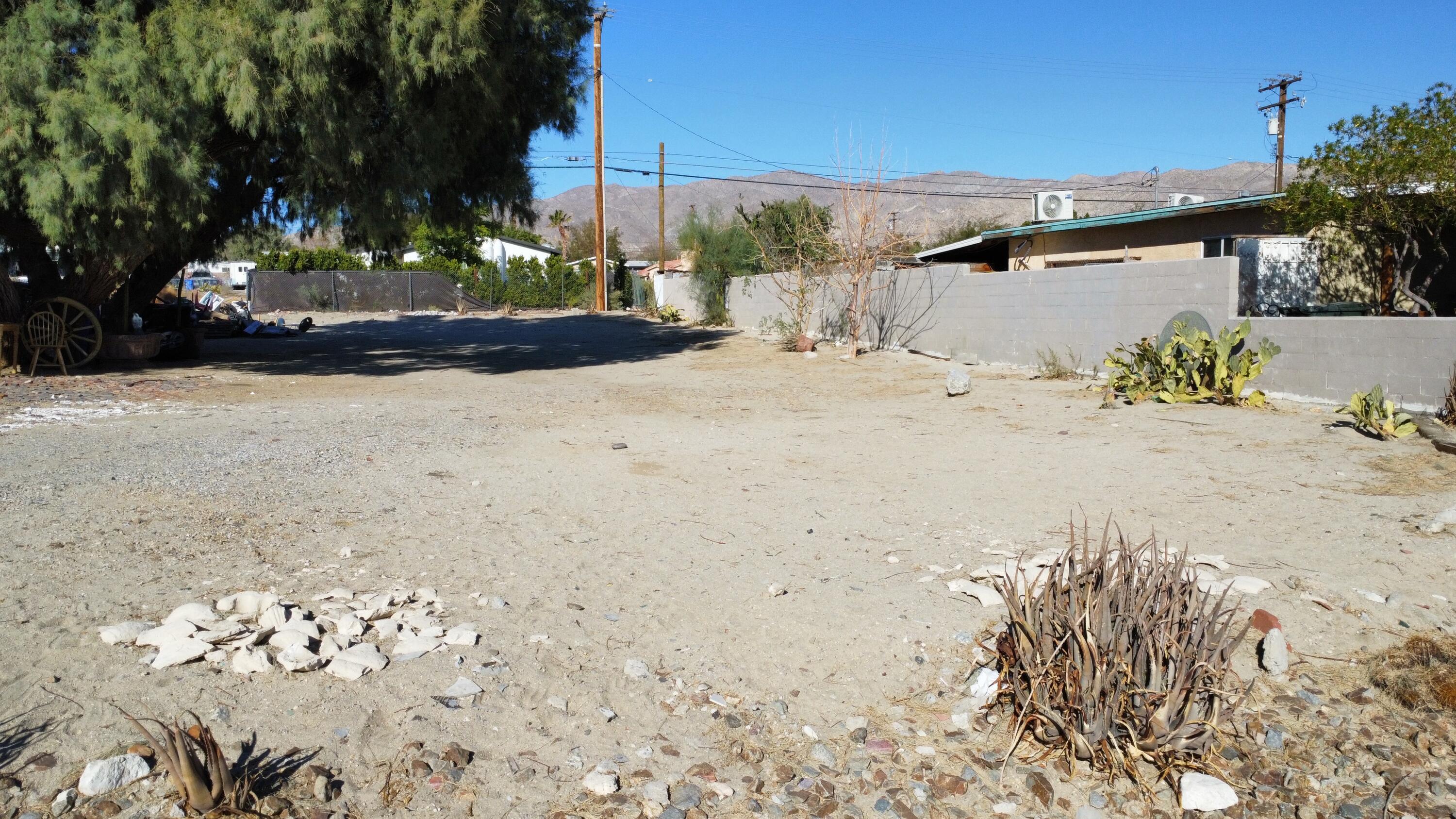 a view of a backyard of the house