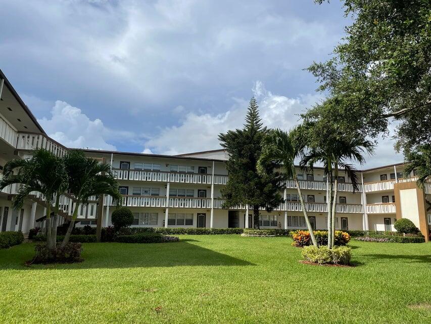 front view of a building with a yard