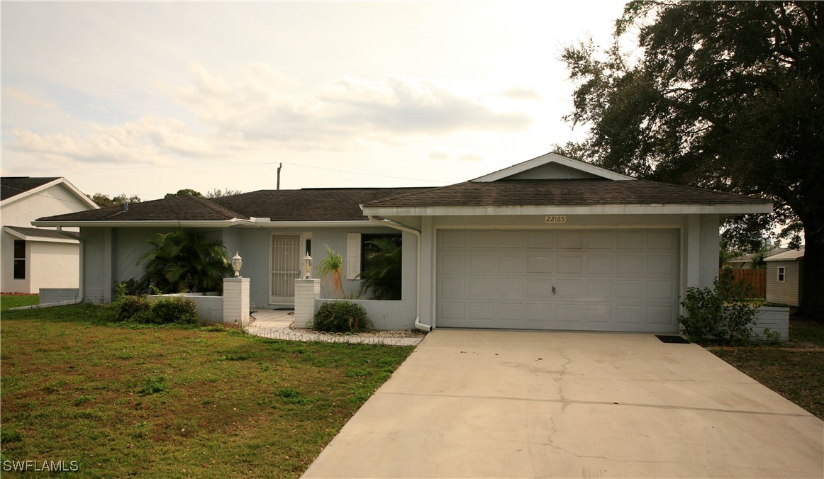 a view of a house with garden