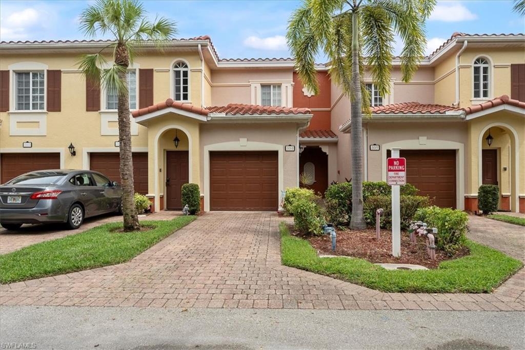 Mediterranean / spanish home featuring a garage