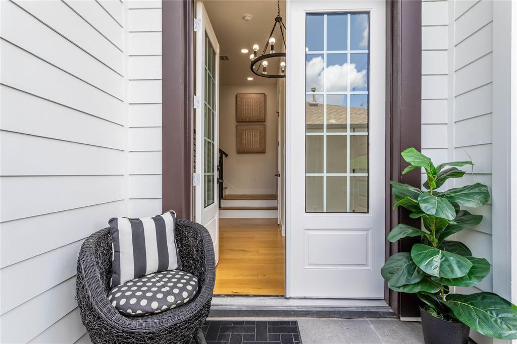 a view of balcony with wooden floor