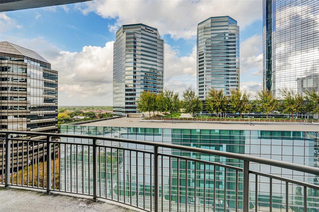 a view of city with tall buildings