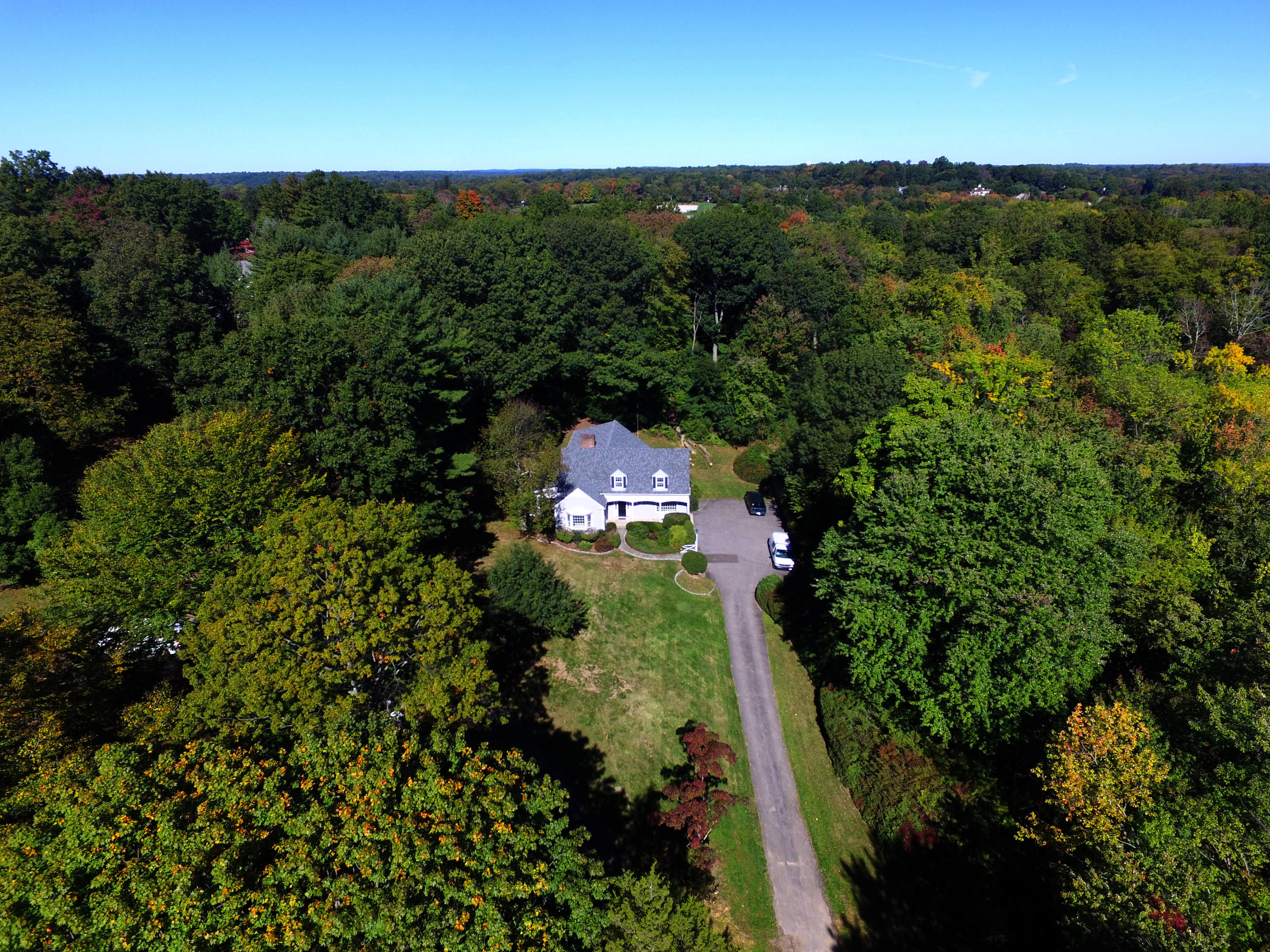 an aerial view of a house with mountain view