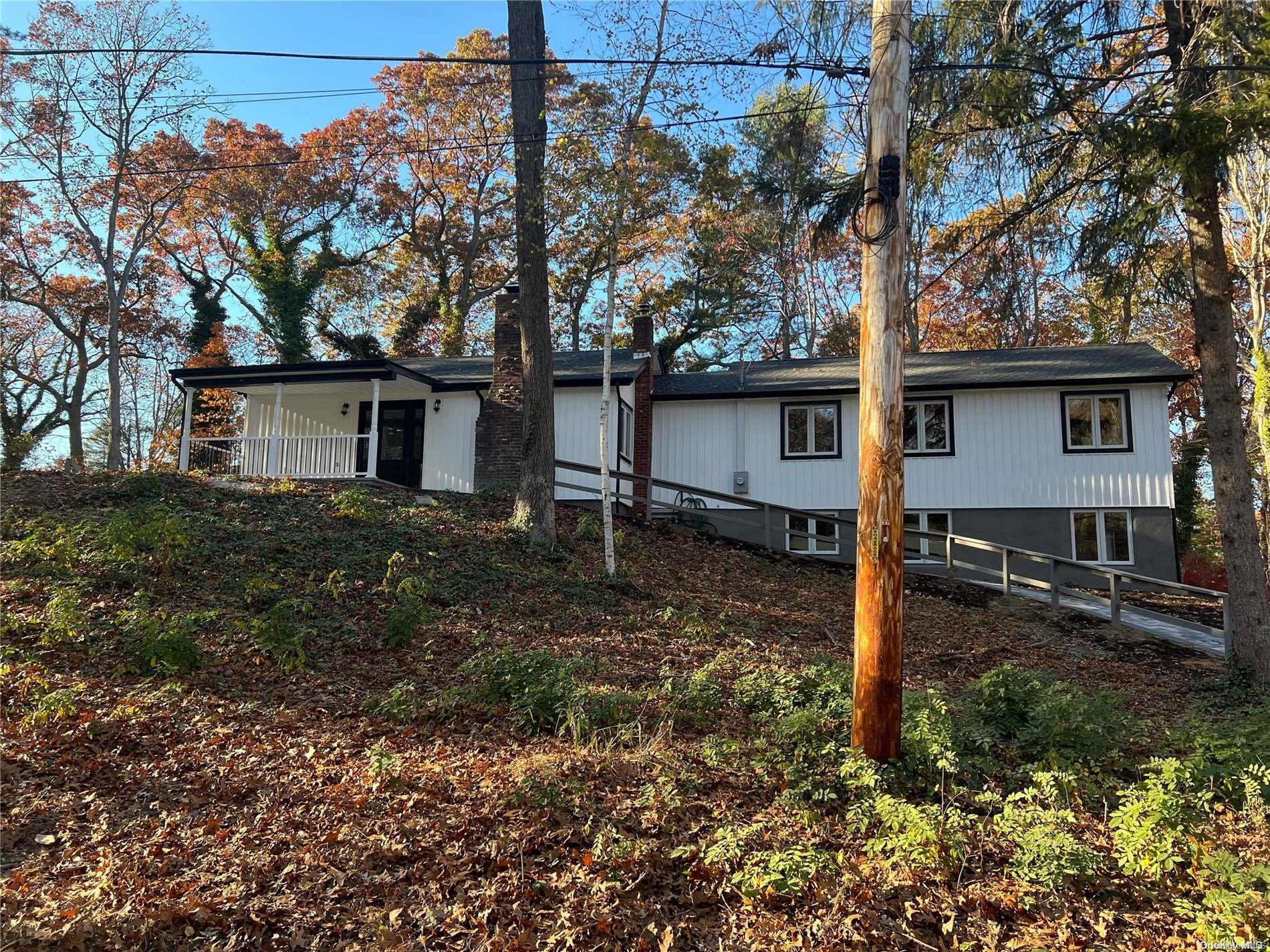 a house view with a backyard space