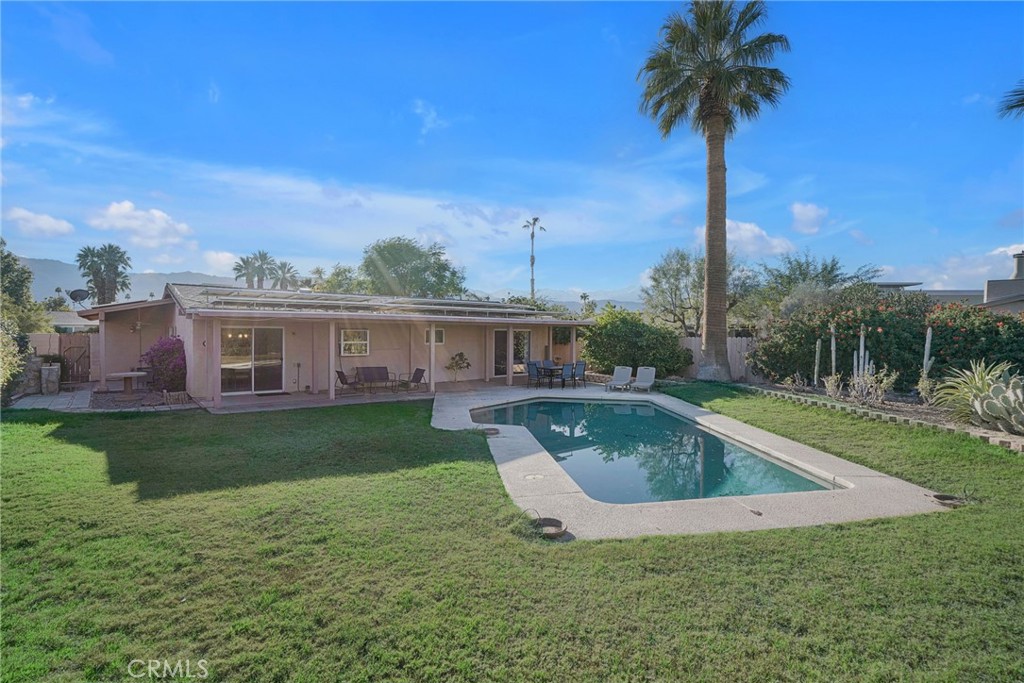 a view of a house with a swimming pool