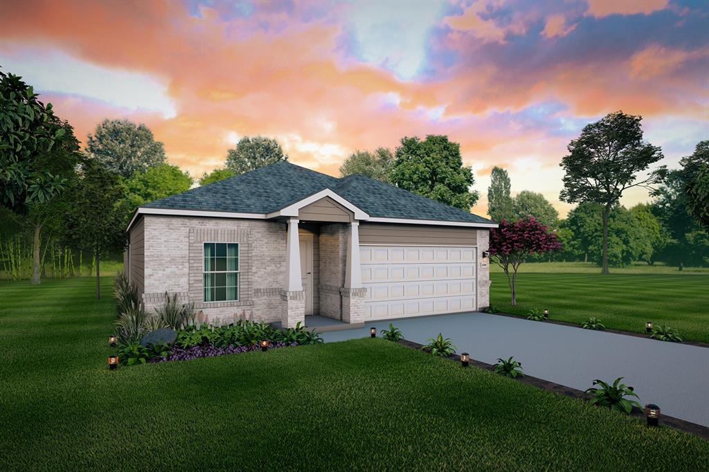 a front view of house with yard and green space