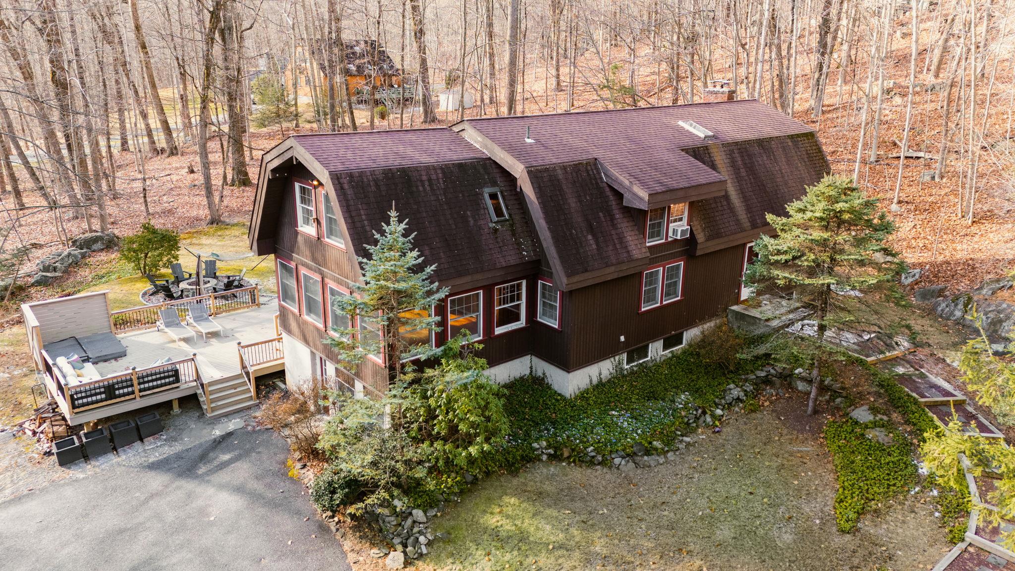 Welcome to 126 Pines Bridge Road—a custom Lindal Cedar Post and Beam home on over 5 private acres. Surrounded by nature, this retreat features a spacious multi-level deck and fire pit area, perfect for entertaining or relaxing in tranquility