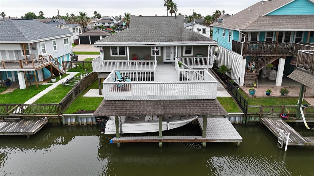 a house with river in front of it