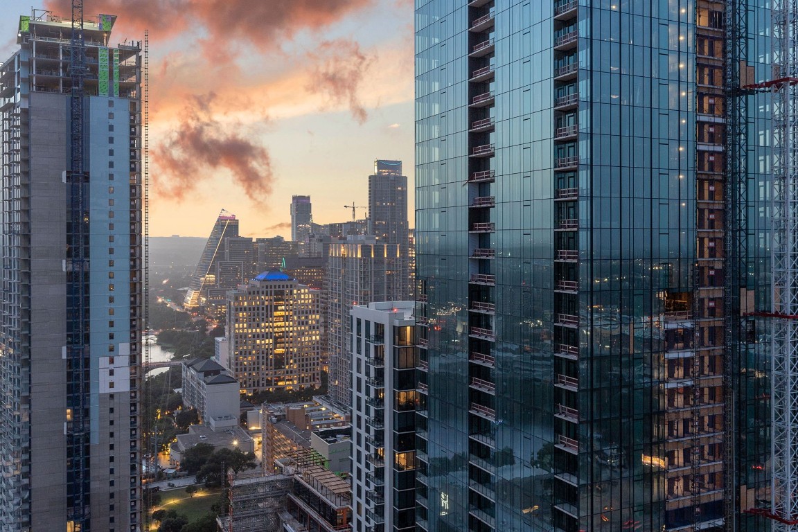 a view of a city with tall buildings