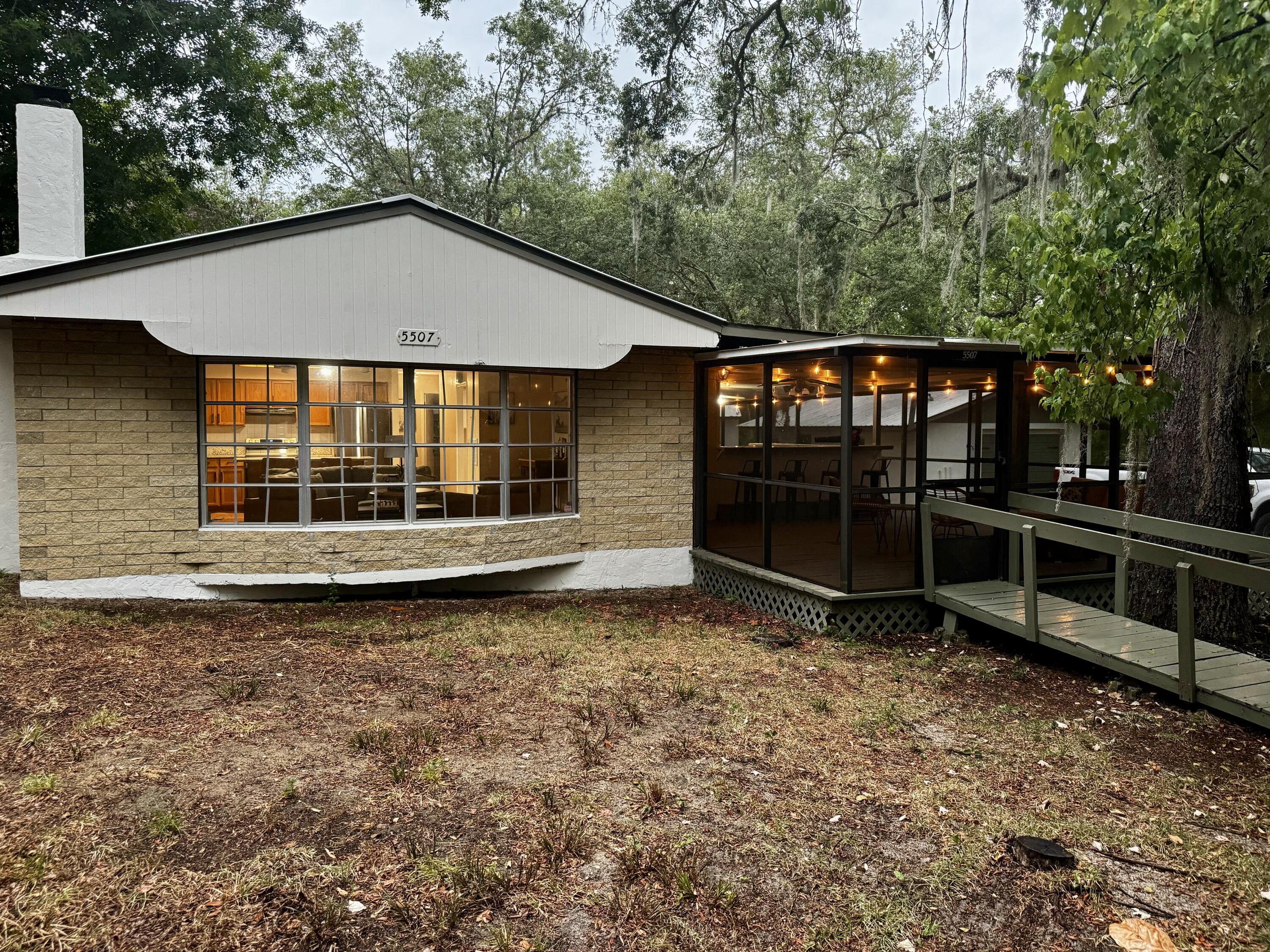 a backyard of a house with lots of green space