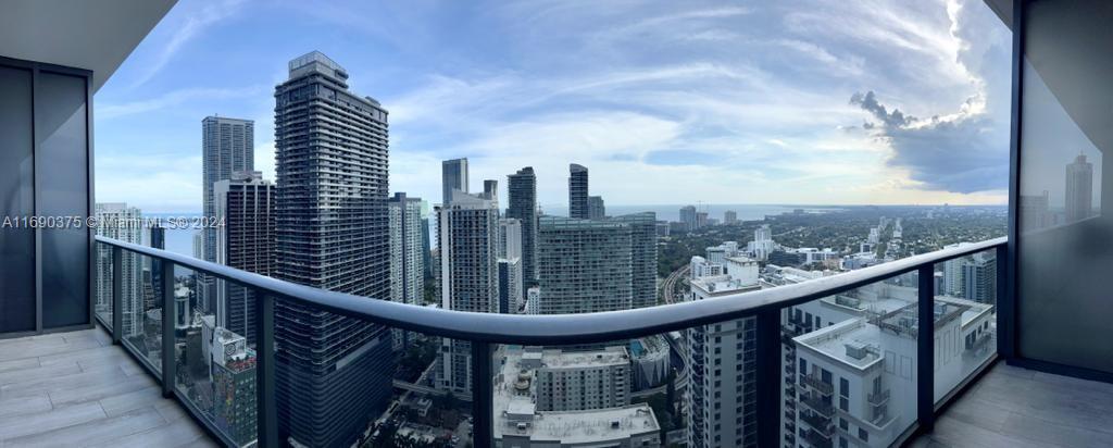 a view of city from a balcony