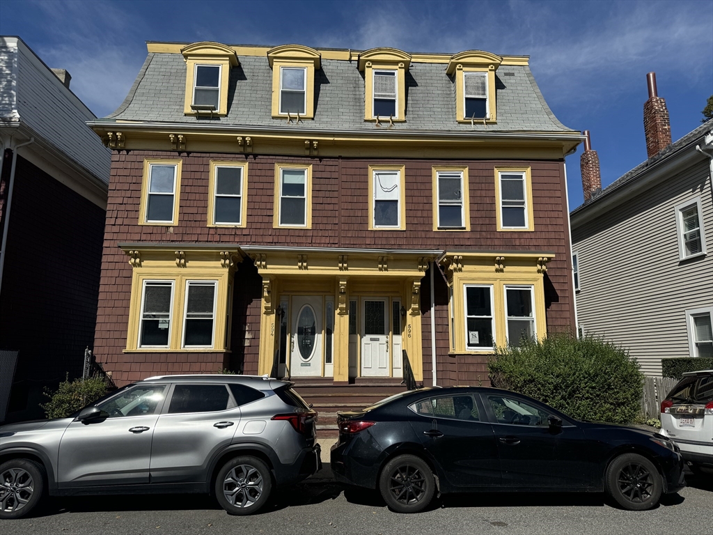 a car parked in front of a building