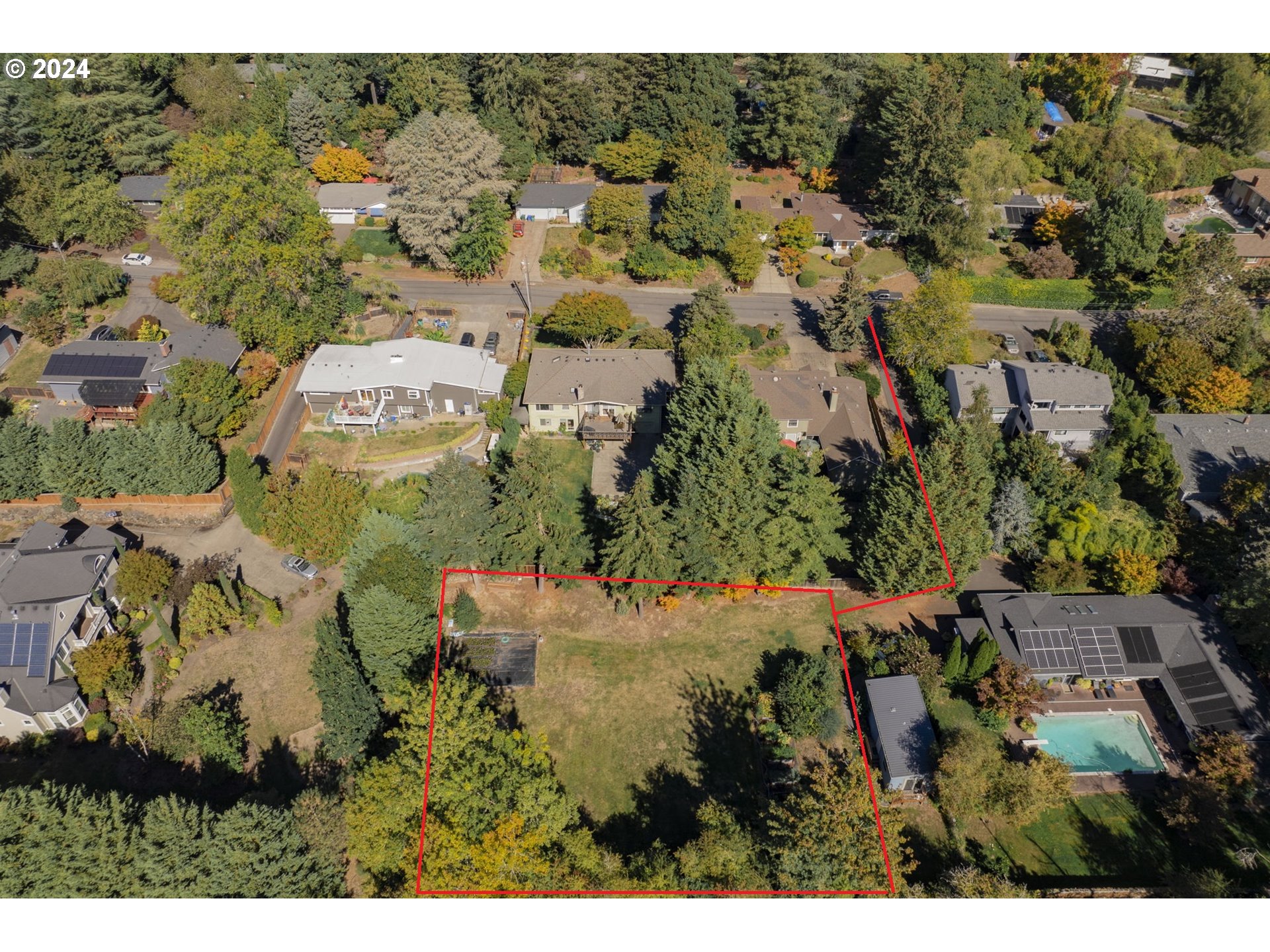 an aerial view of residential house with outdoor space