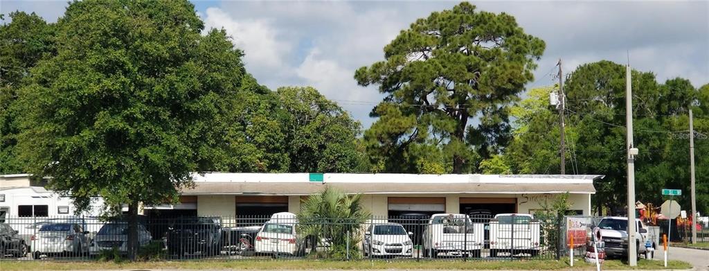 a view of a car park in front of building