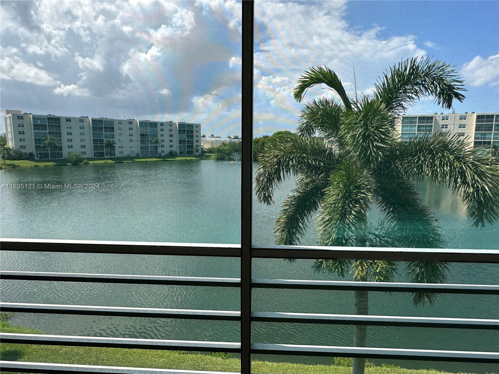 a view of swimming pool from a balcony