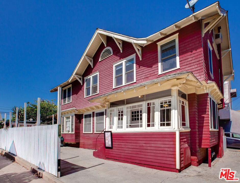 a front view of a house with a porch