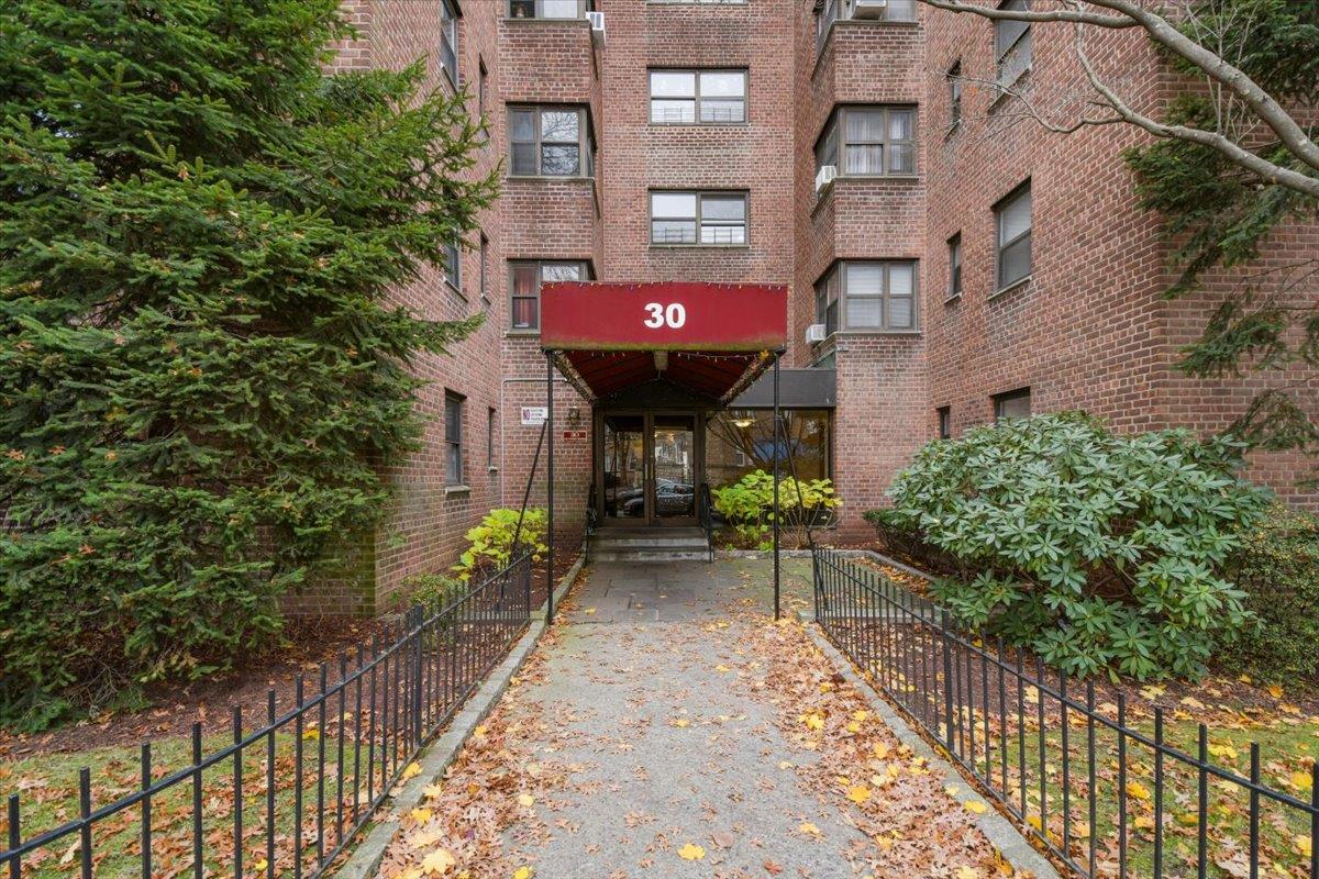 a view of a building with a bench