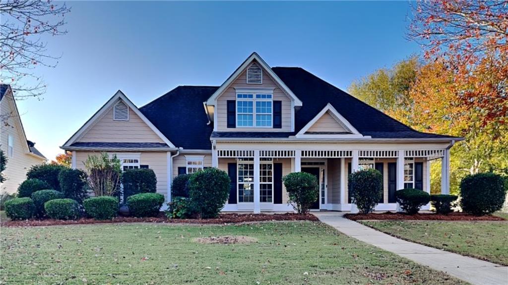 front view of a house with a yard