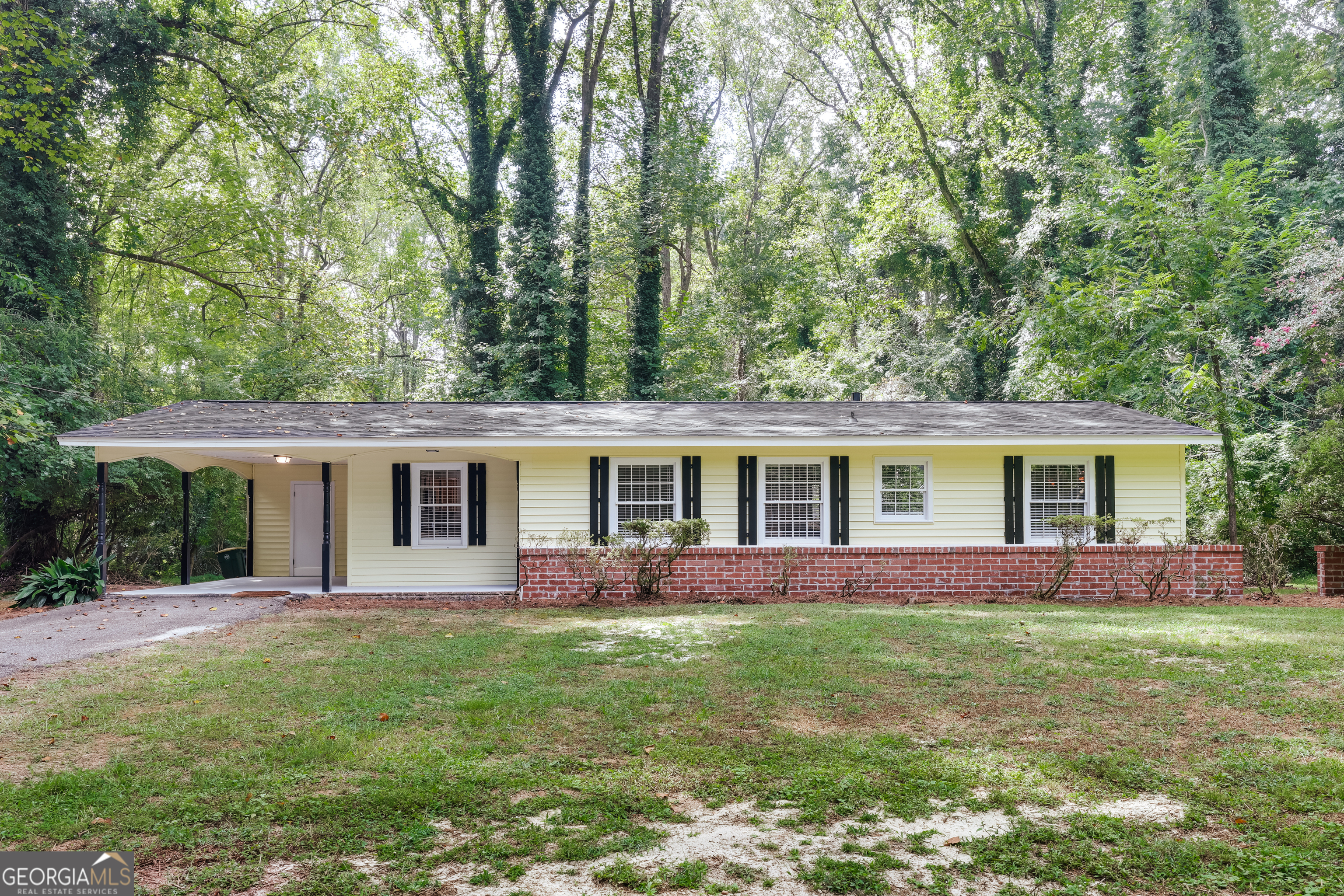 front view of a house with a yard