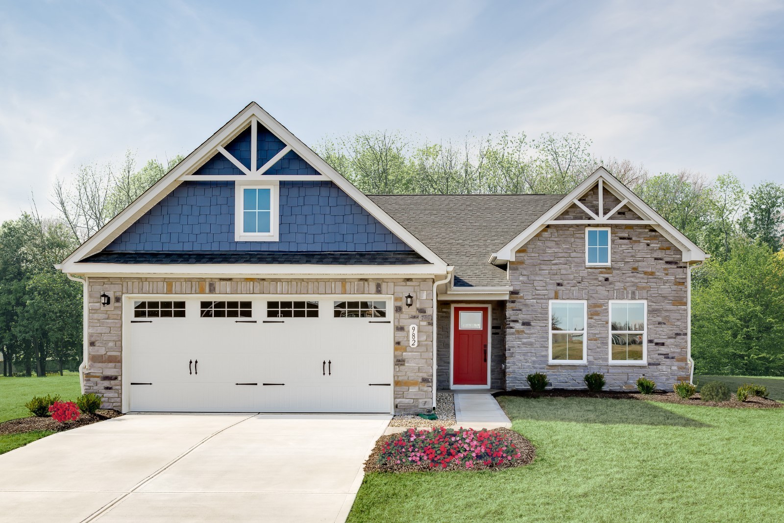 a front view of a house with yard