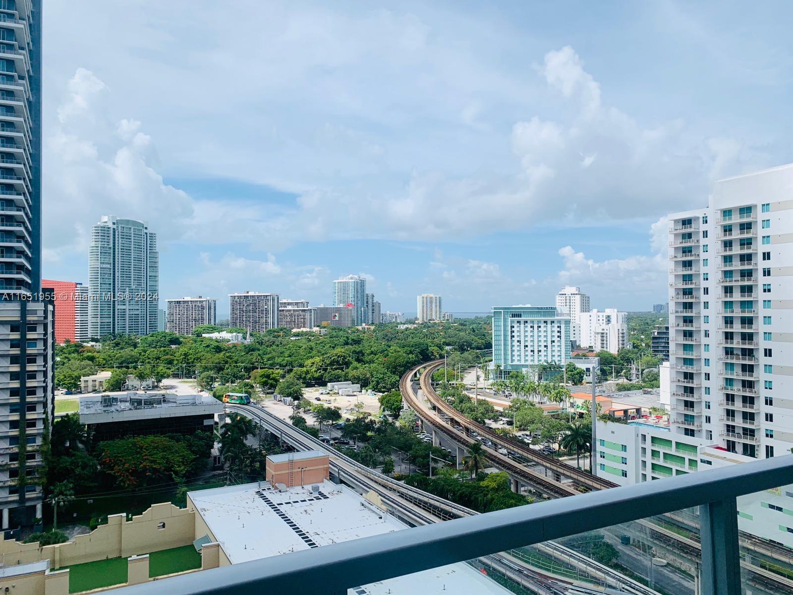 a city view from a balcony