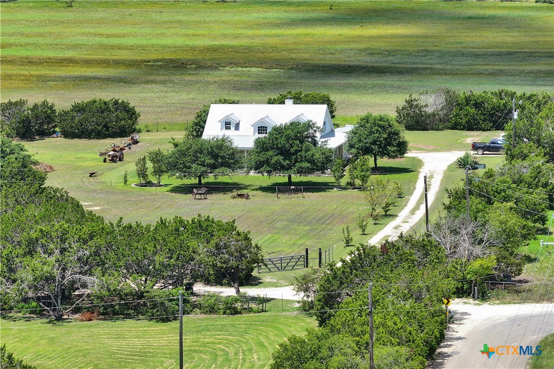 a view of a lake with a yard