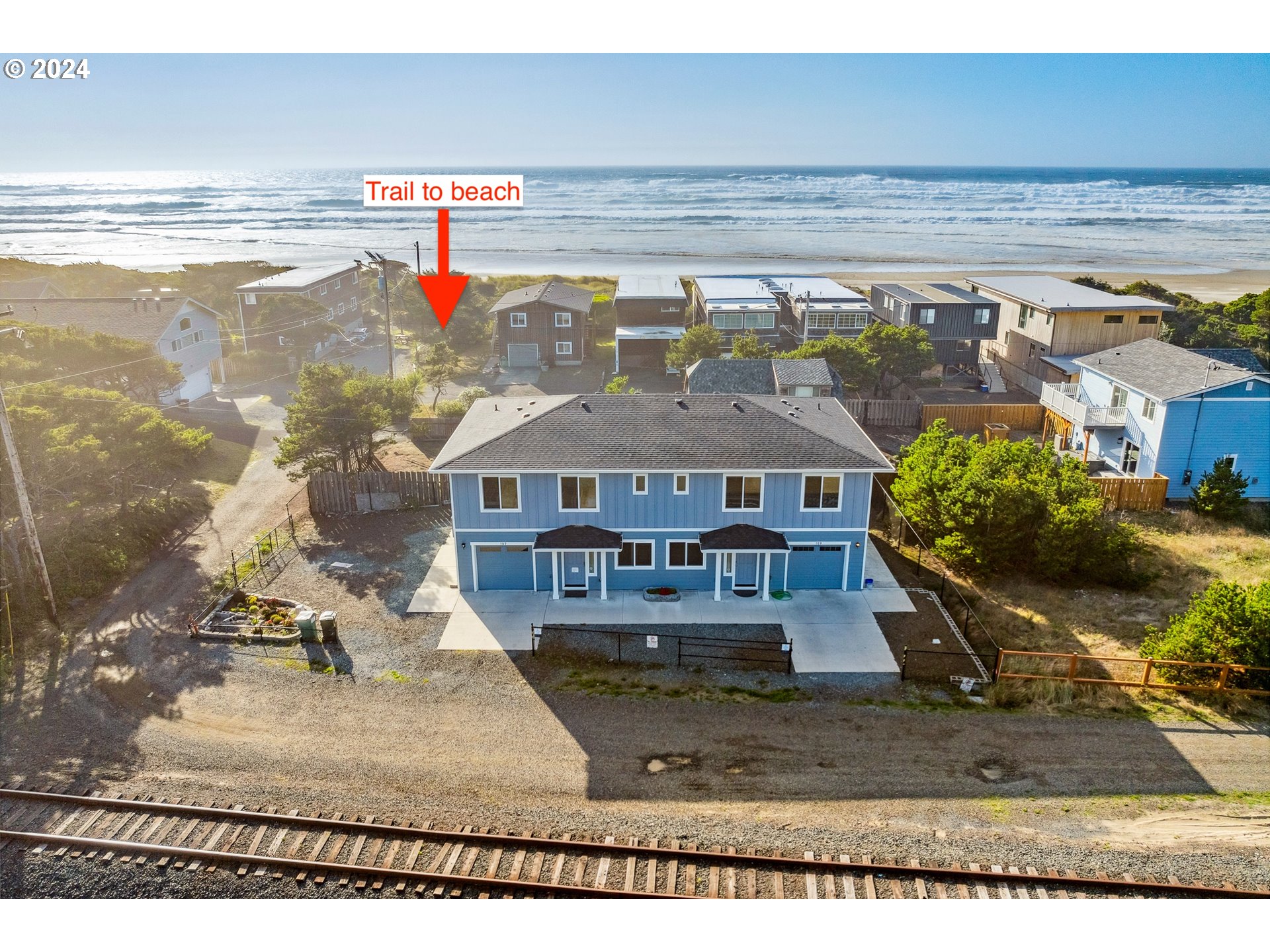 a view of a house with a ocean view