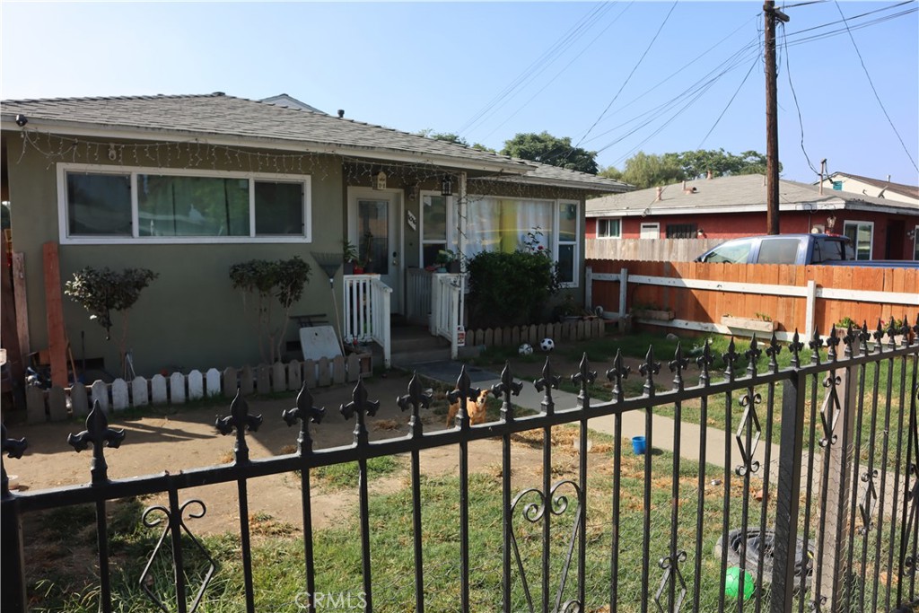 a view of house with outdoor seating