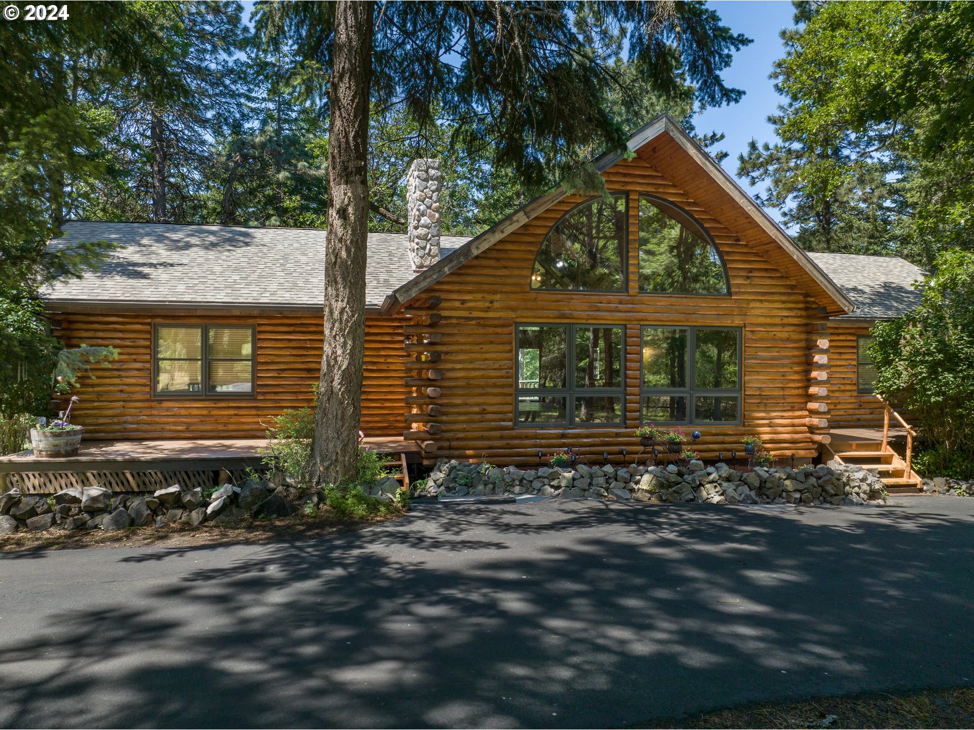 a front view of a house with yard