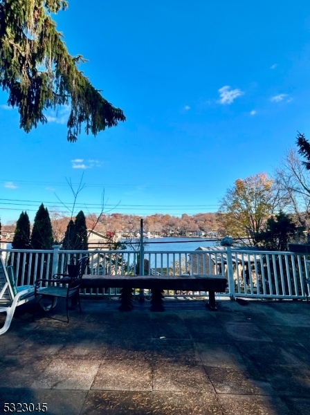 a view of swimming pool yard and lake view