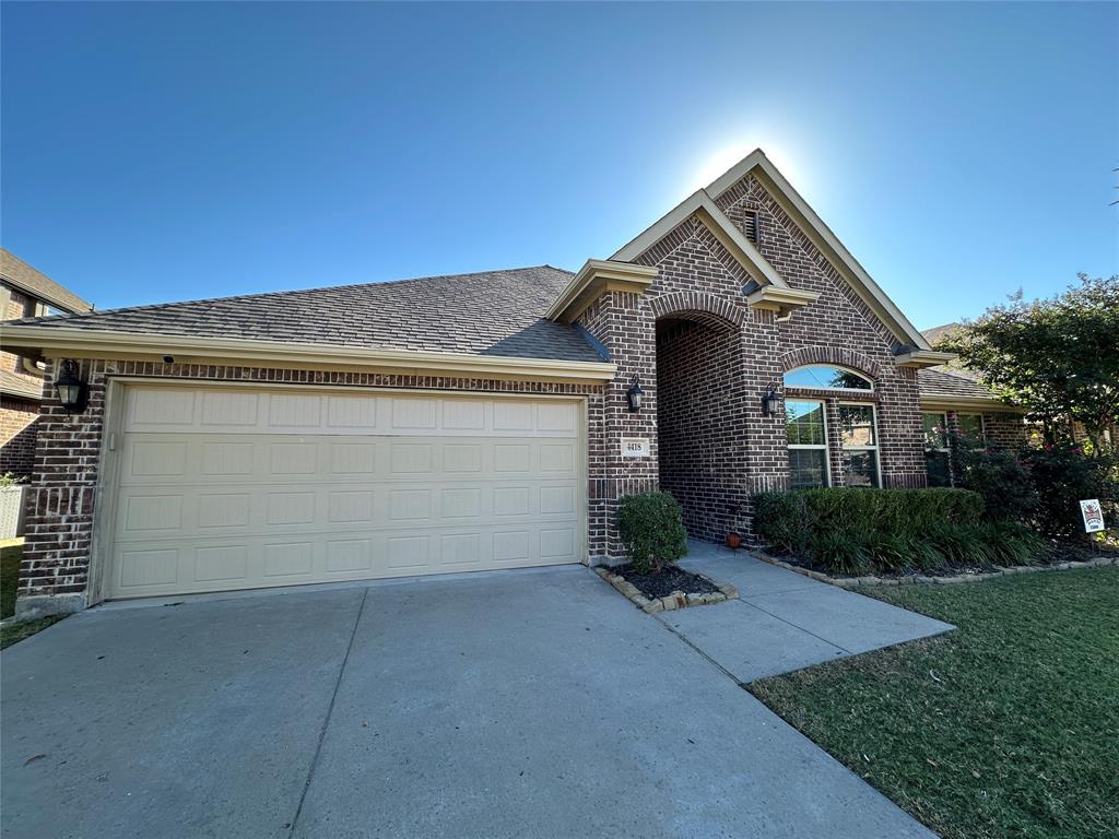 front view of a house with yard