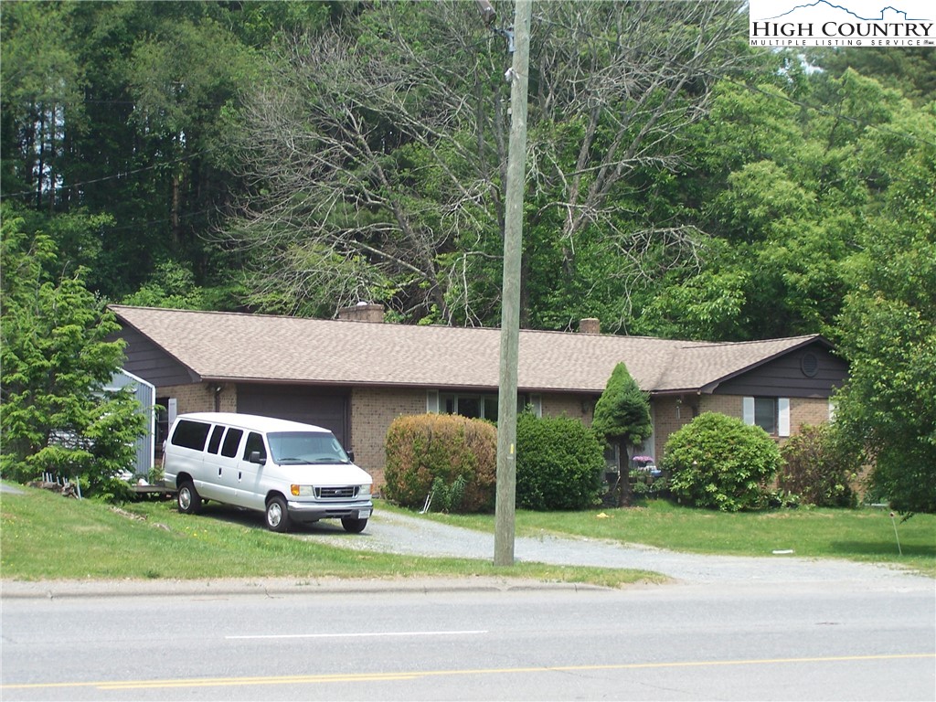 a house with trees in front of it