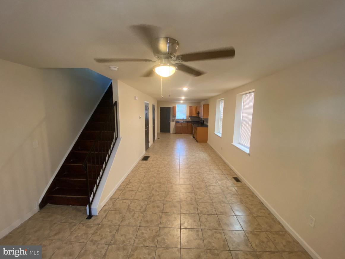 a view of entryway and hall with a window