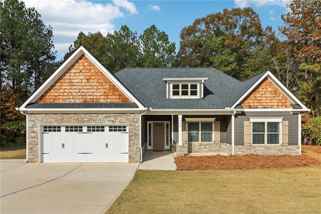 front view of a house with a yard