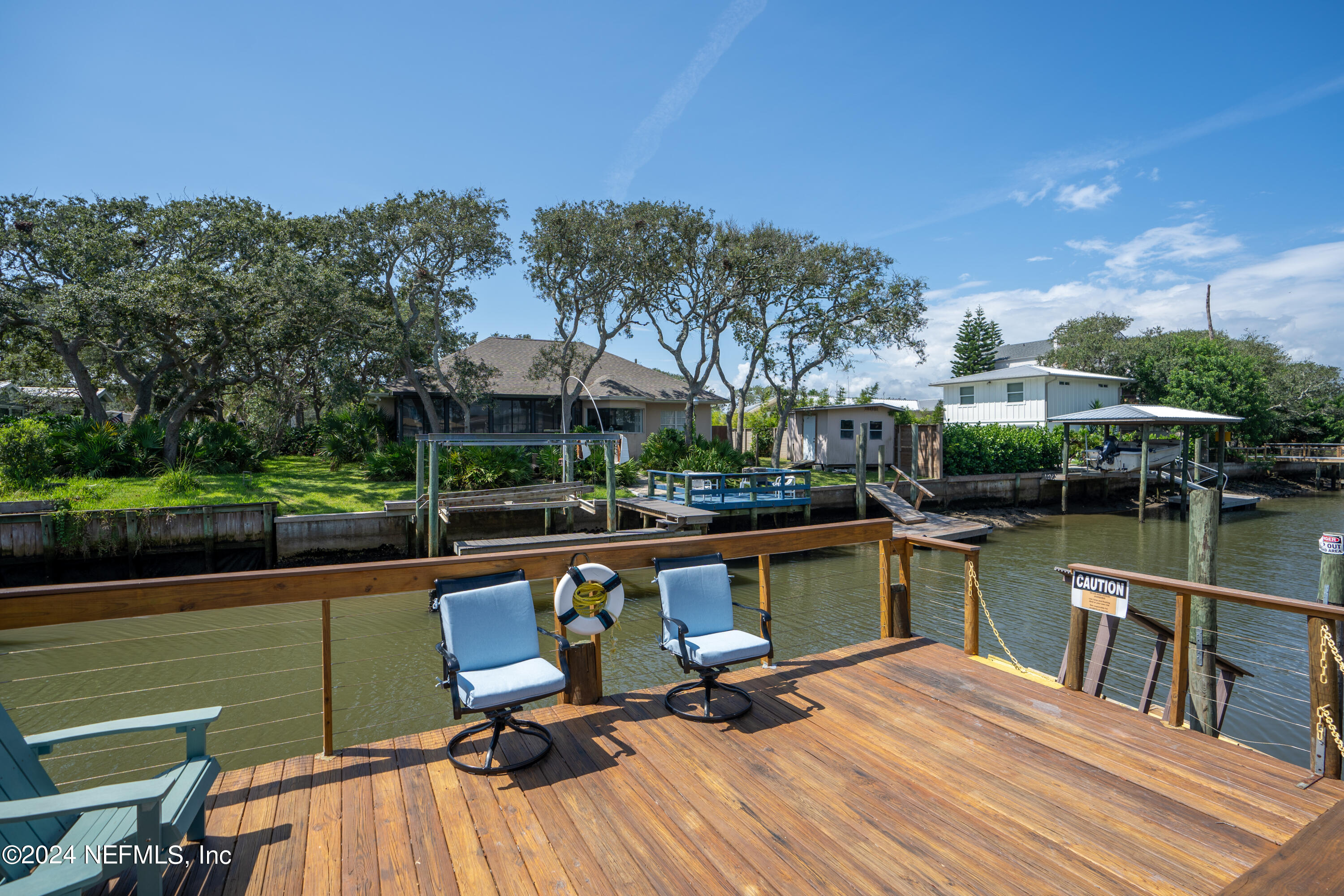 a view of a lake with a deck