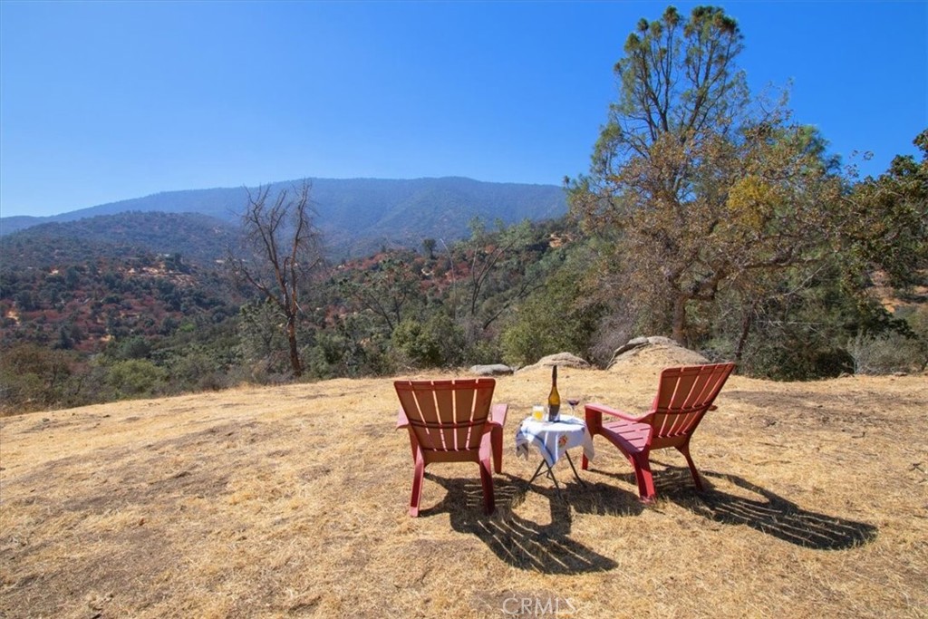 a patio with a table and chairs