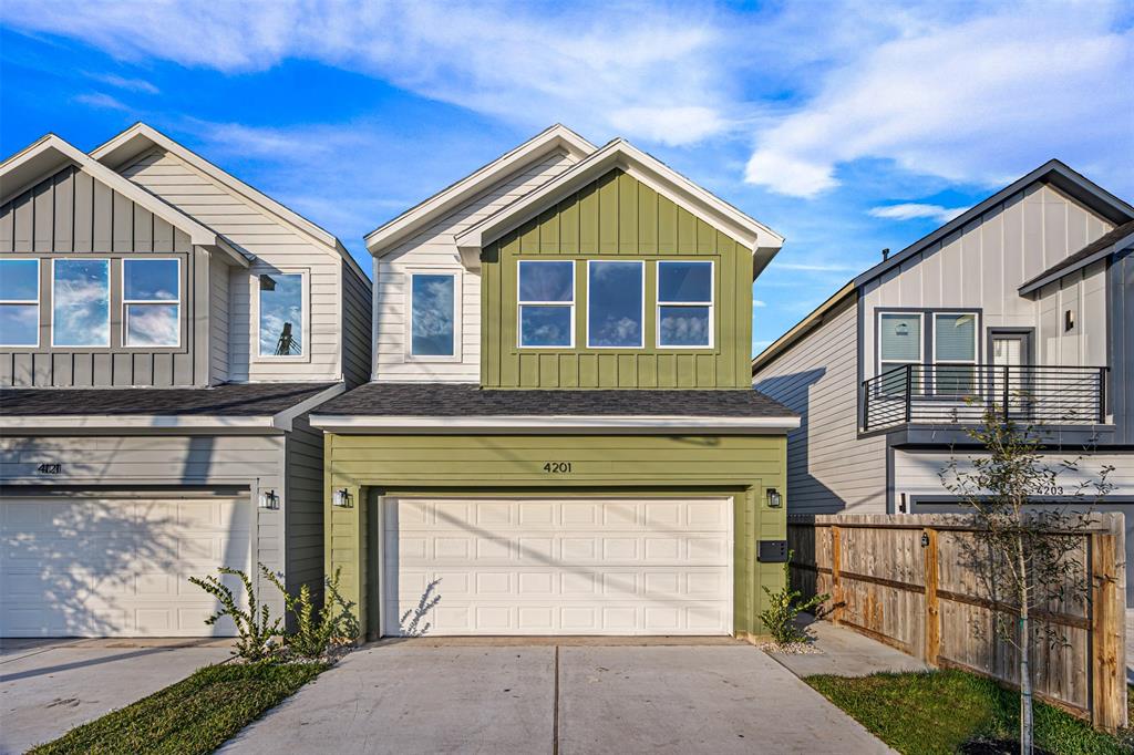 a front view of a house with a garage