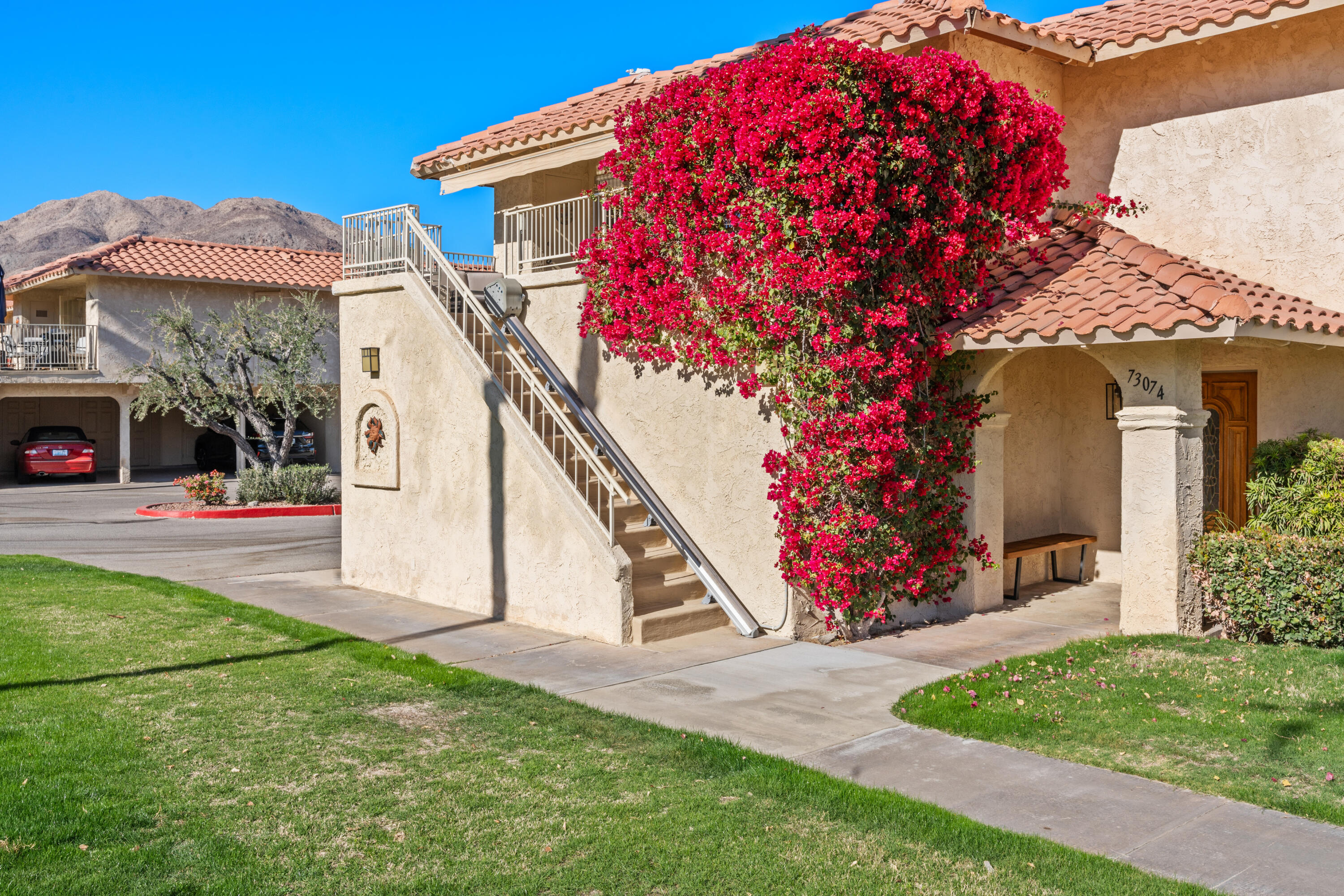 a front view of a house with a yard