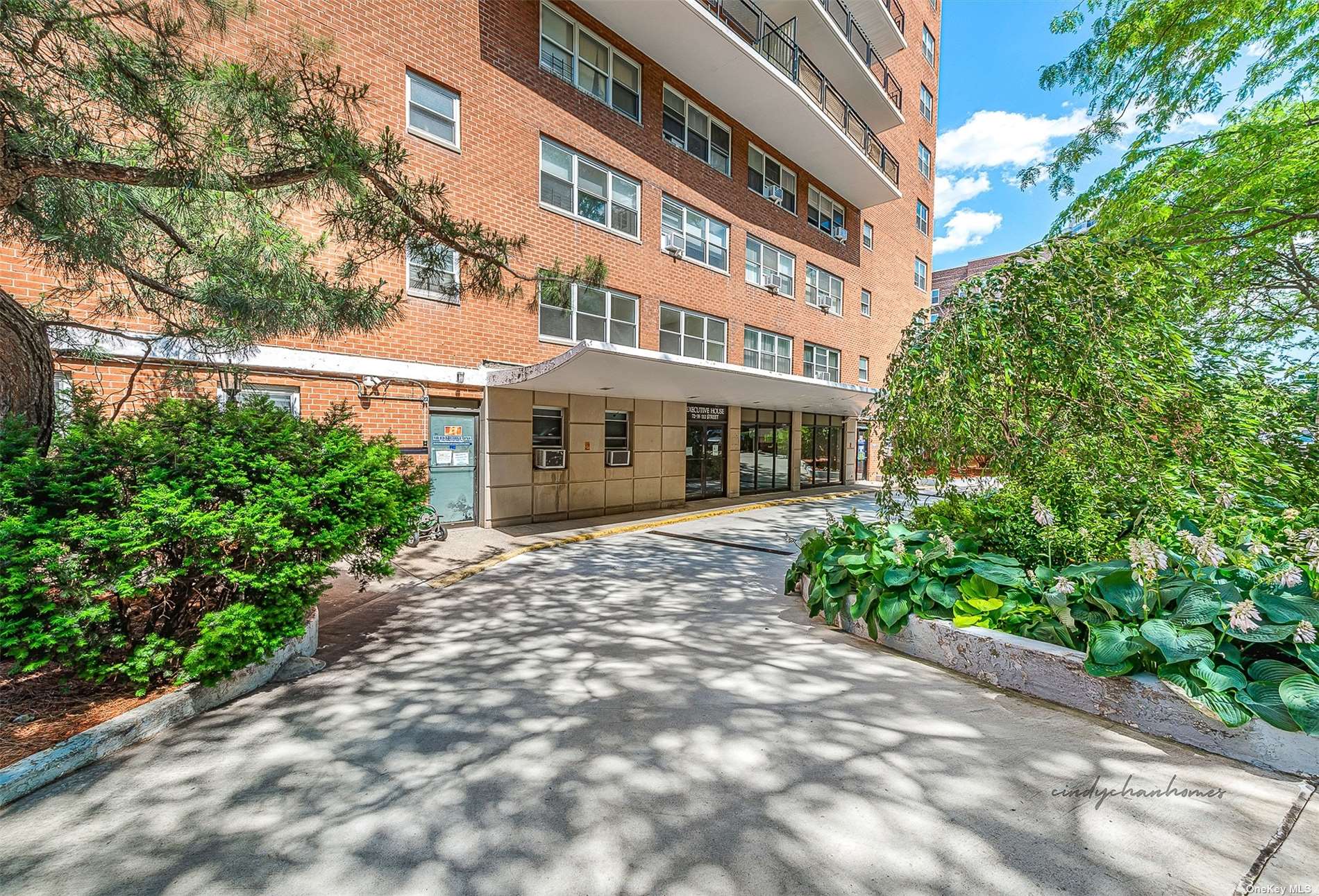 a view of a building with a garden