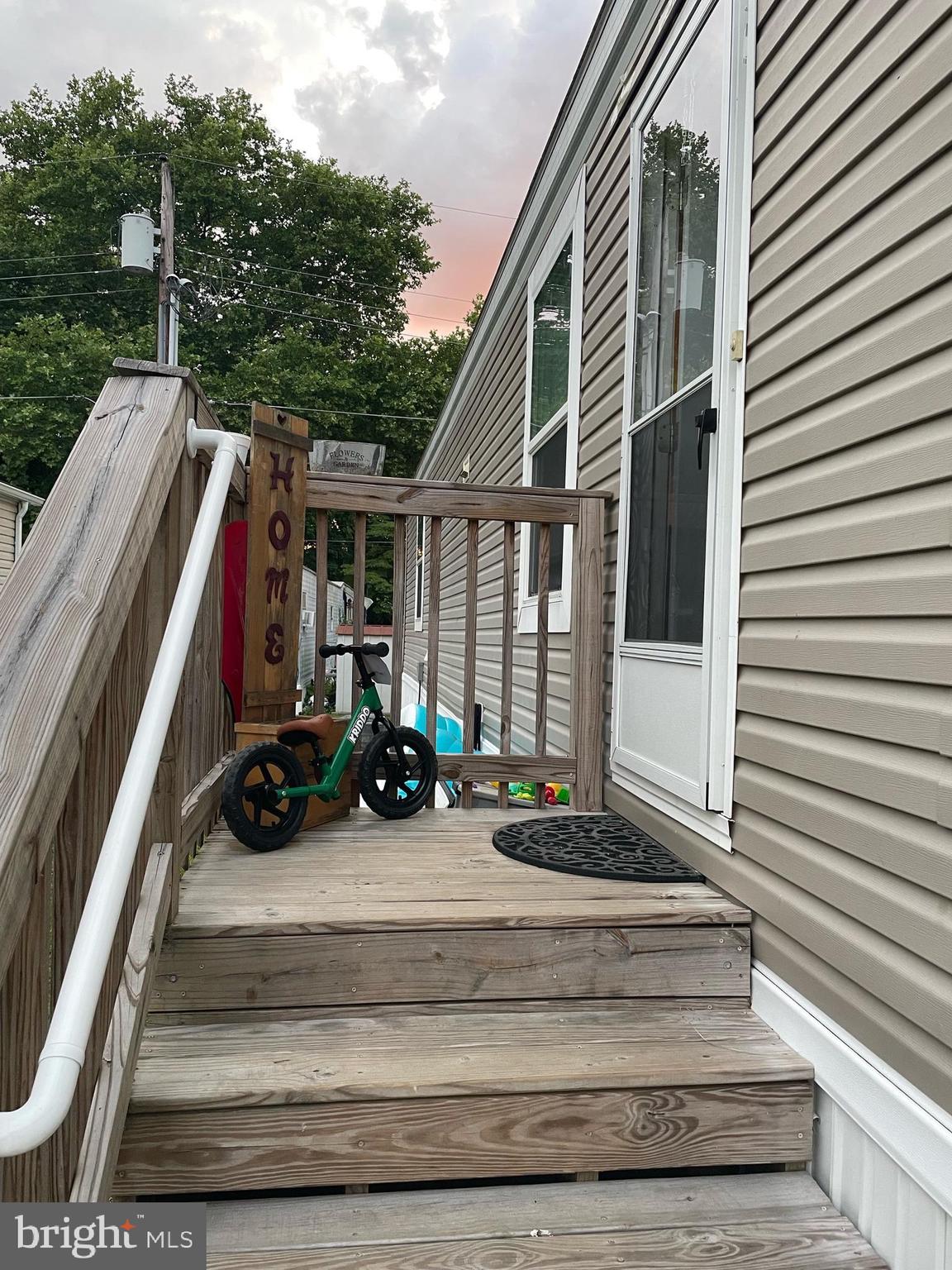 a view of house with outdoor seating