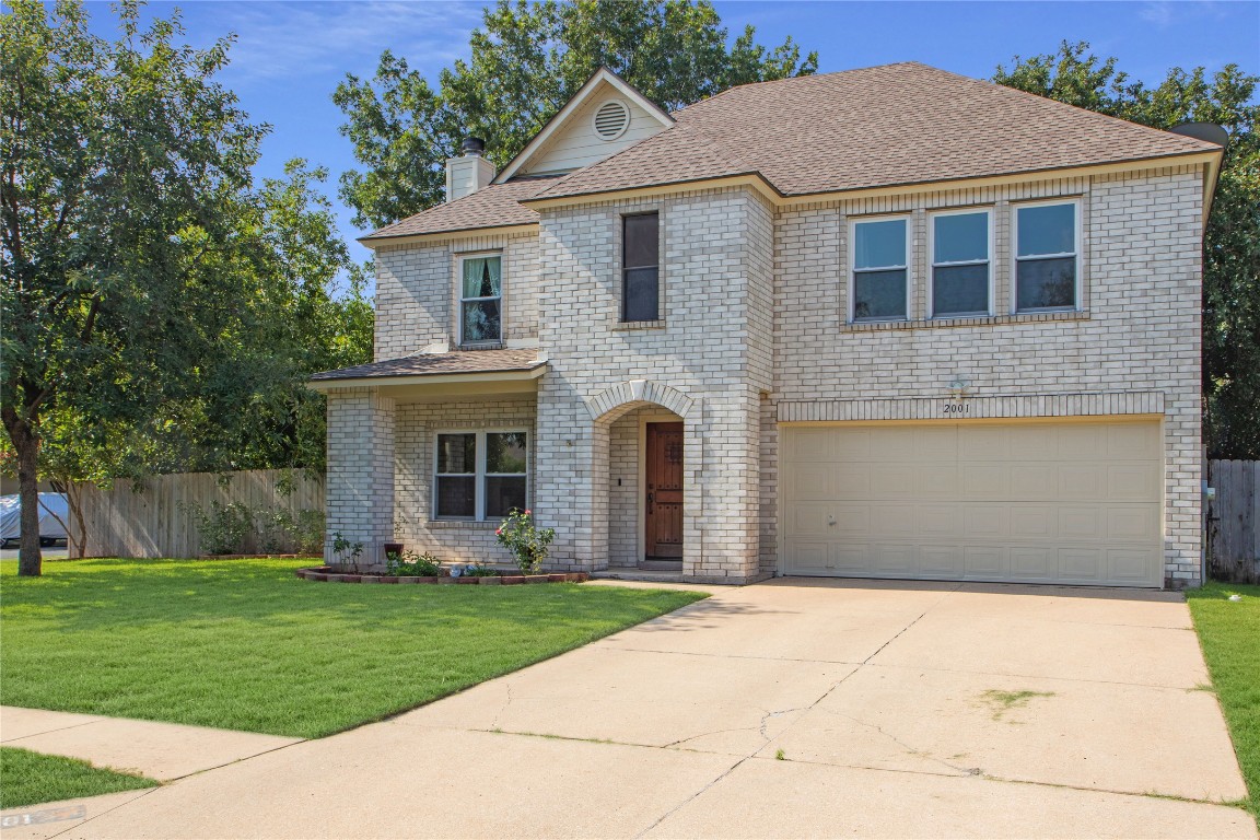 a front view of house with yard