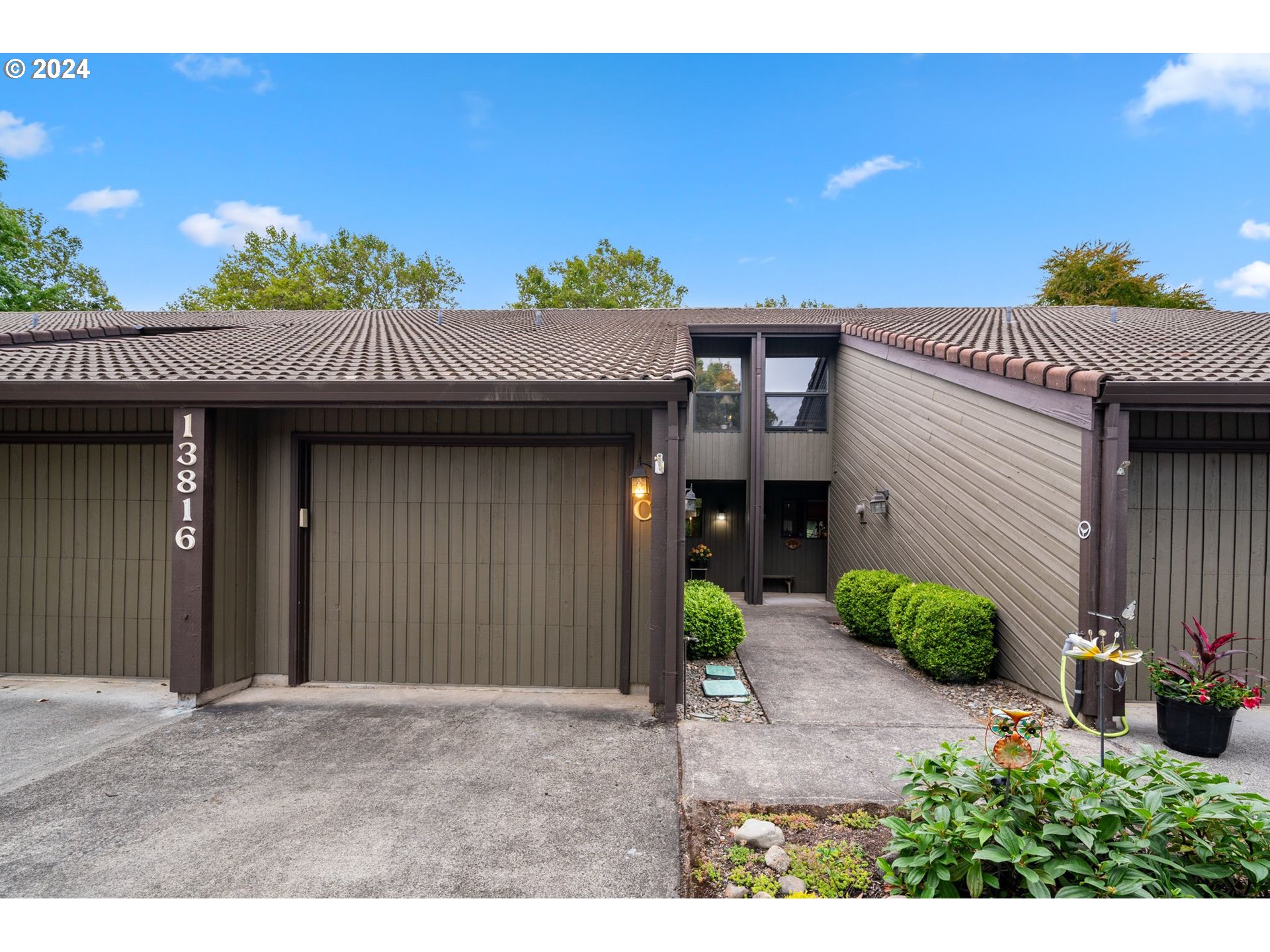 a view of a house with a garage