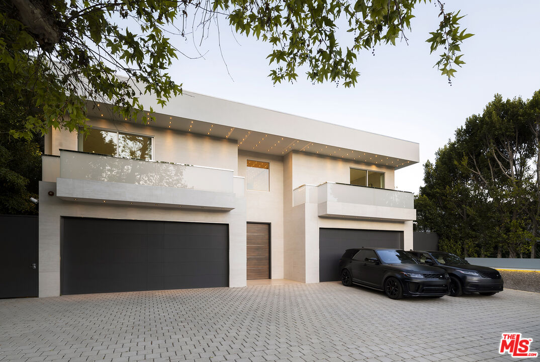 a black and white building with a outdoor space