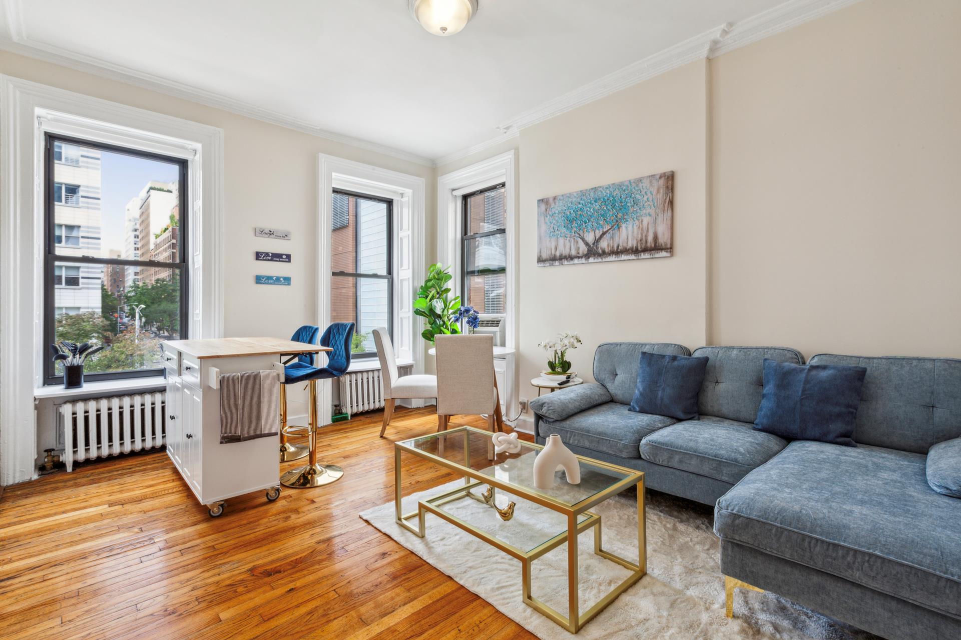 a living room with furniture and a window